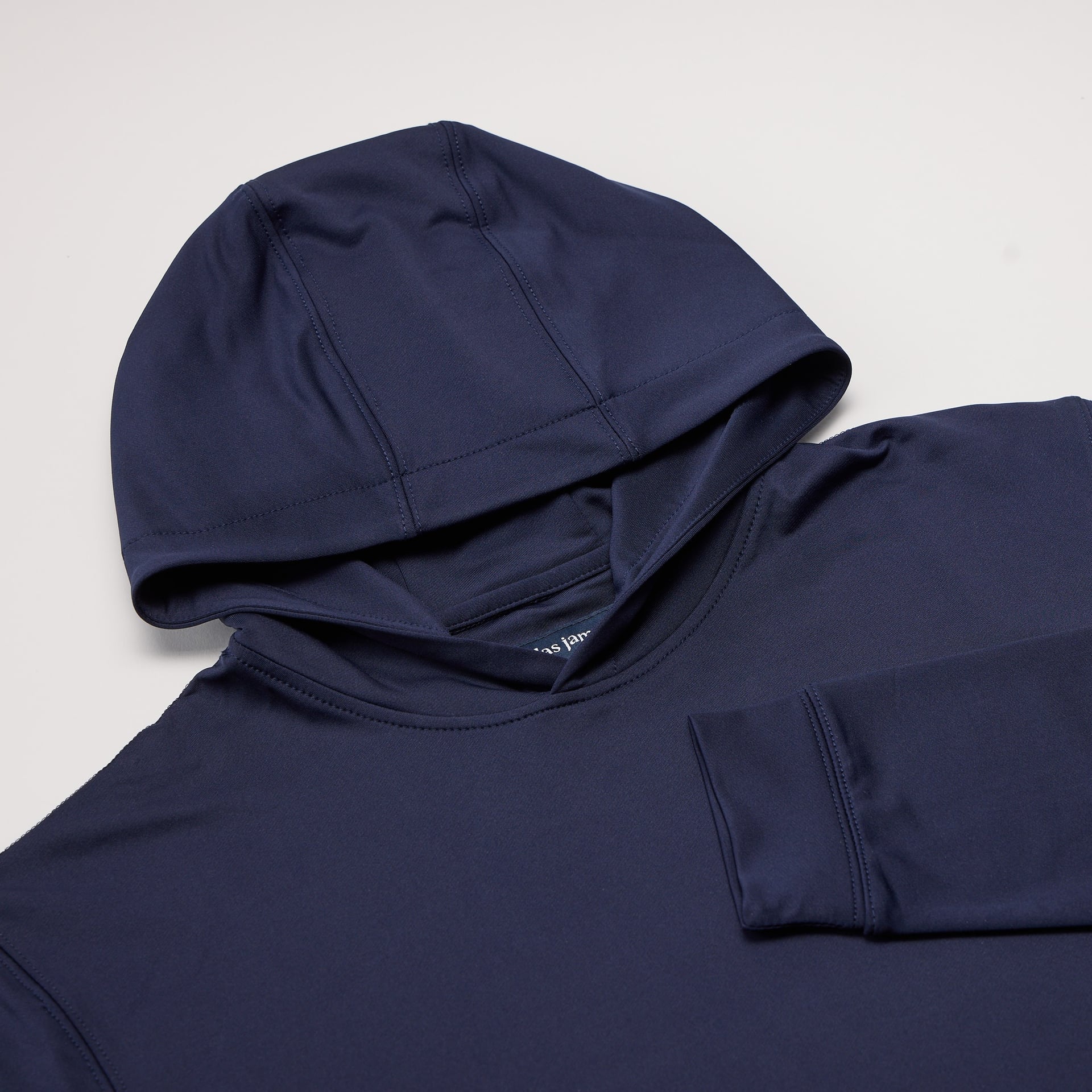 Navy blue hoodie on a light gray background