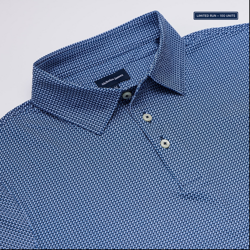 Blue patterned shirt with collar and buttons on a light gray background